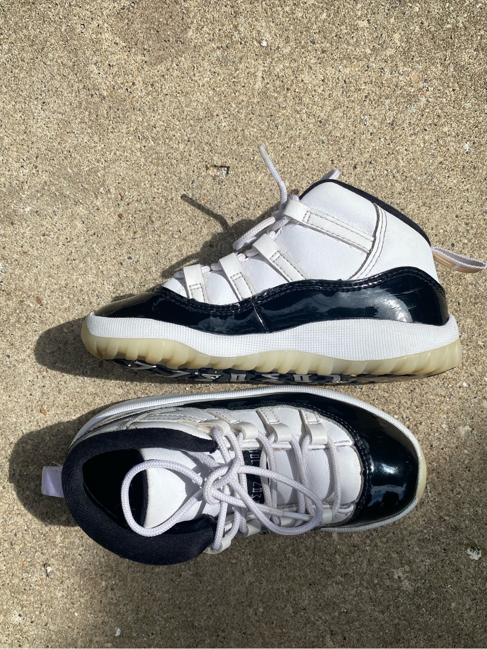 Jordan Kids Black and White High-Top Sneakers